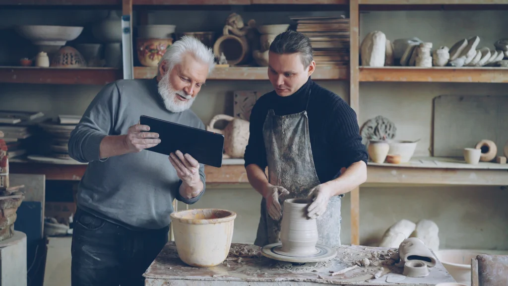 Experienced owner coaching the next generation of a family business