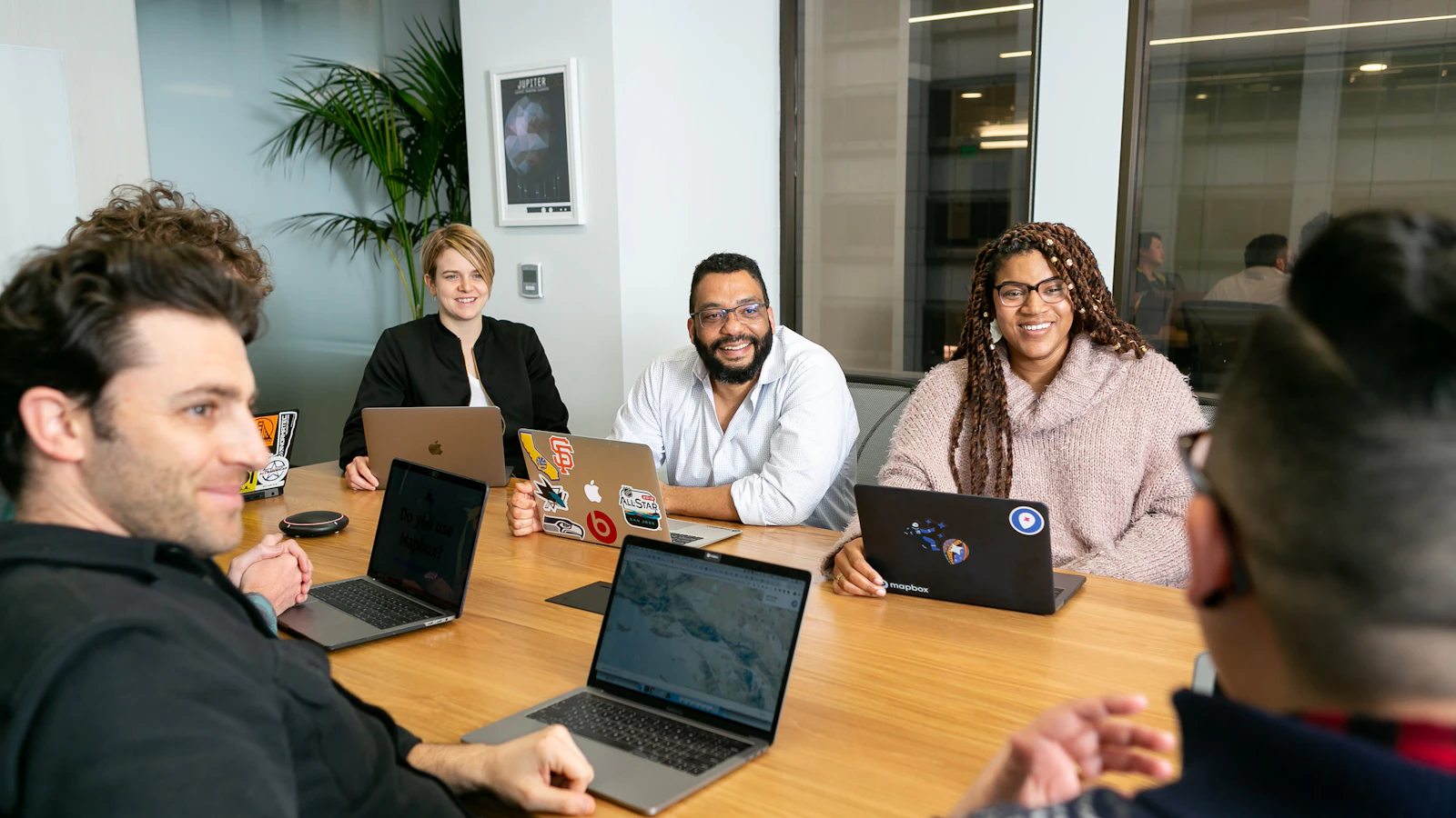 Family business leadership team meeting before hiring a technology partner